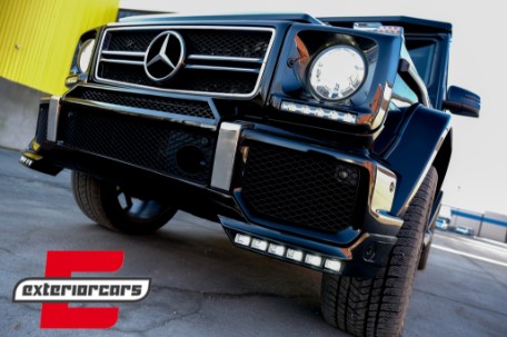 Prednji nastavak branika LED DRL AMG B-dizajn (crna) / Mercedes G-klasa W463 (1989-2017), FBSMBW463BK